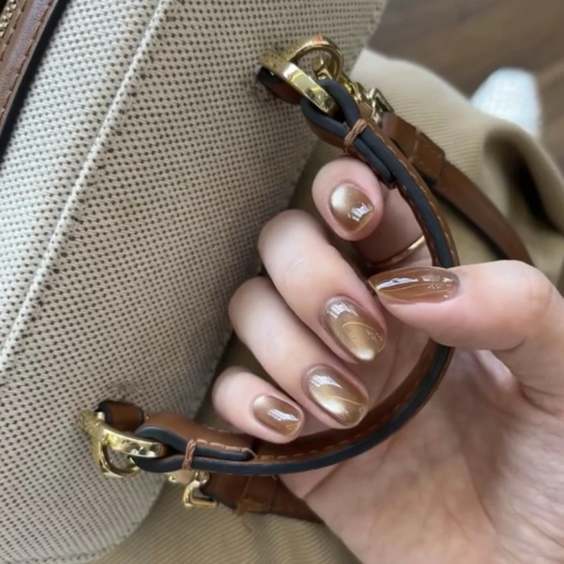 Elegant Nail Art with Glitter Decorations Stornfield