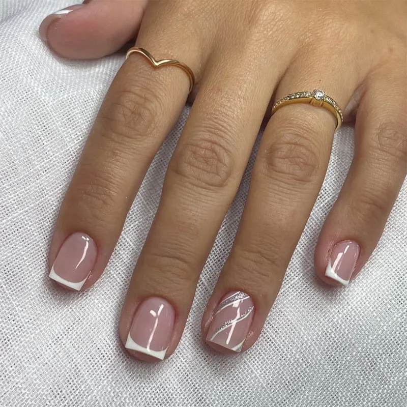 Elegant Nail Art with Glittering French Tip Stornfield