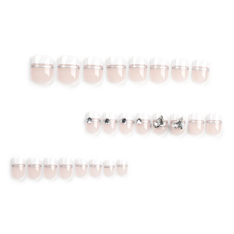Elegant Nail Art with Glitter Accents and Jewelry Details Stornfield