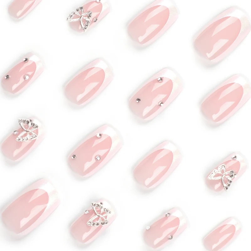 Elegant Nail Art with Glitter and Floral Accents Stornfield
