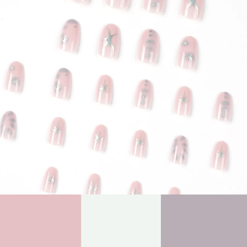 Elegant nail art with glamorous metal embellishments Stornfield