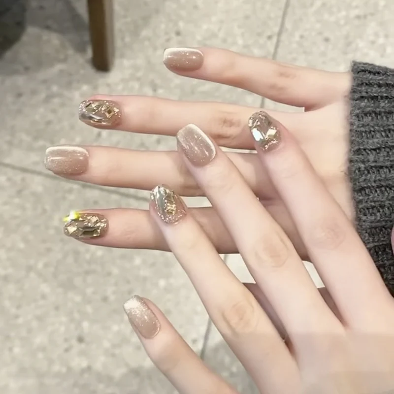 Elegant Nail Art with Glamorous Accents Stornfield