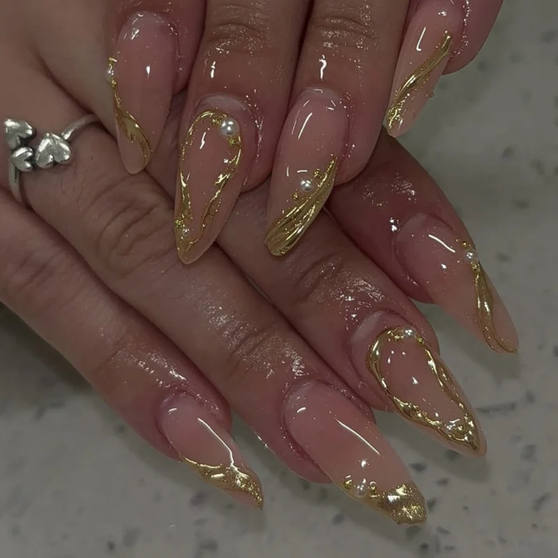 Elegant nail art in maritime design with glitter and 3D accents Stornfield