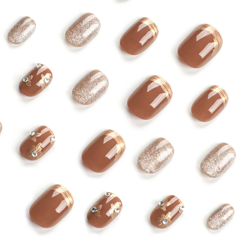Elegant Nail Decoration with Glitter and Floral Accents Stornfield