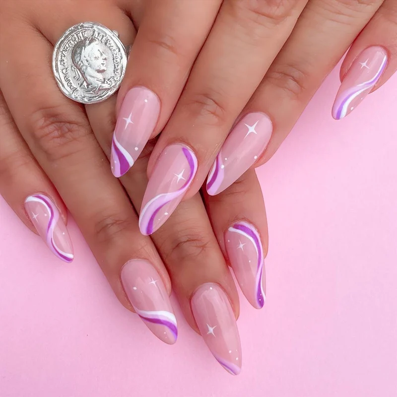 Elegant artistic nail extensions with delicate gradient and accented lines Stornfield