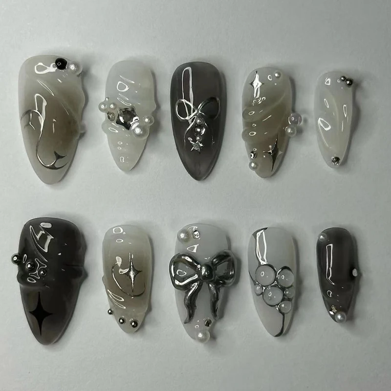 Elegant artificial nails with modern design and glitter accents Stornfield