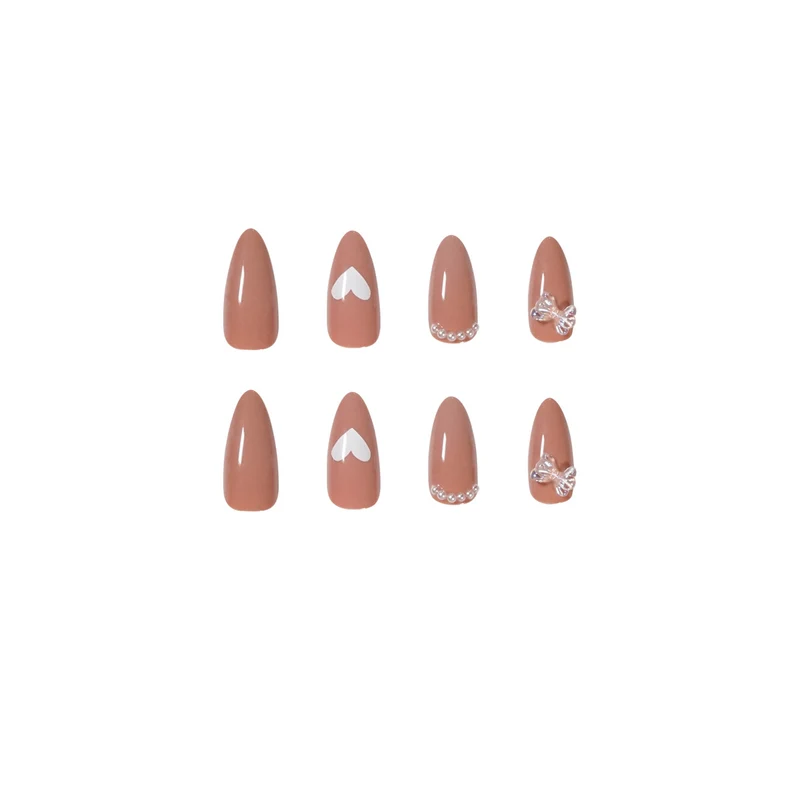 Elegant artificial nails with heart-shaped and glitter accents Stornfield