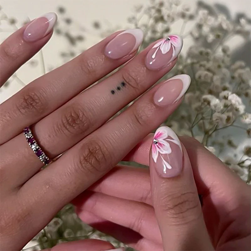 Elegant artificial nails with floral decorations Stornfield