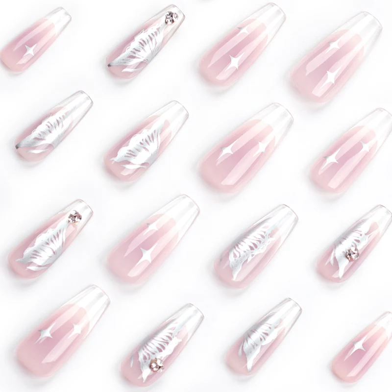 Elegant artificial nails with floral designs and glitter accents Stornfield