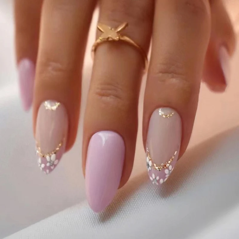 Elegant artificial nails with floral design and golden accents Stornfield