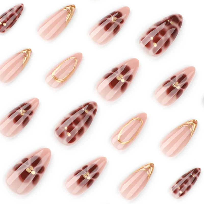 Elegant artificial nails with floral accents and gold details Stornfield