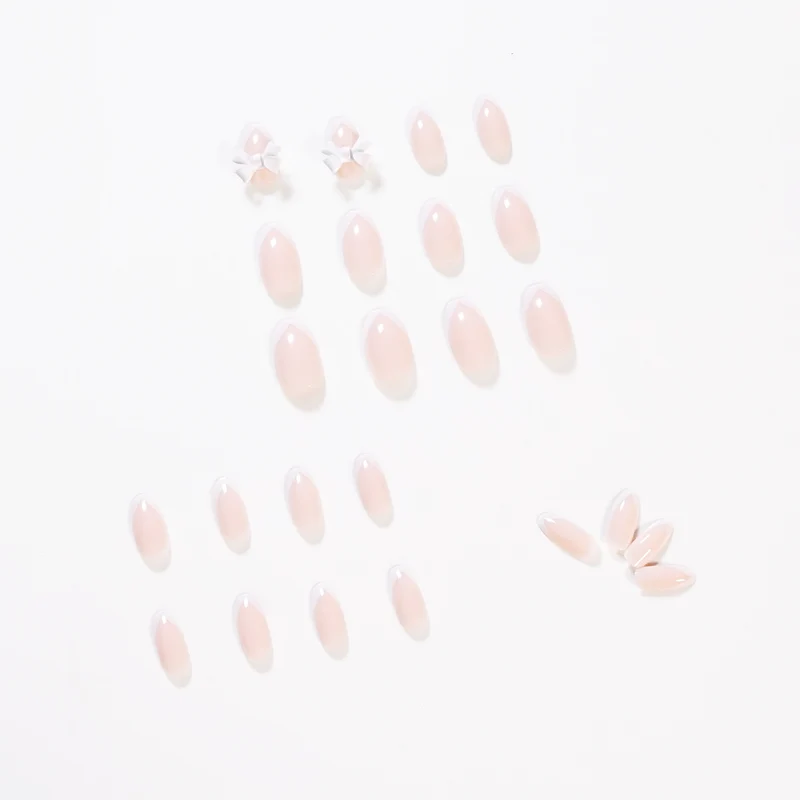 Elegant artificial nails with translucent French tip and decorative floral accents Stornfield