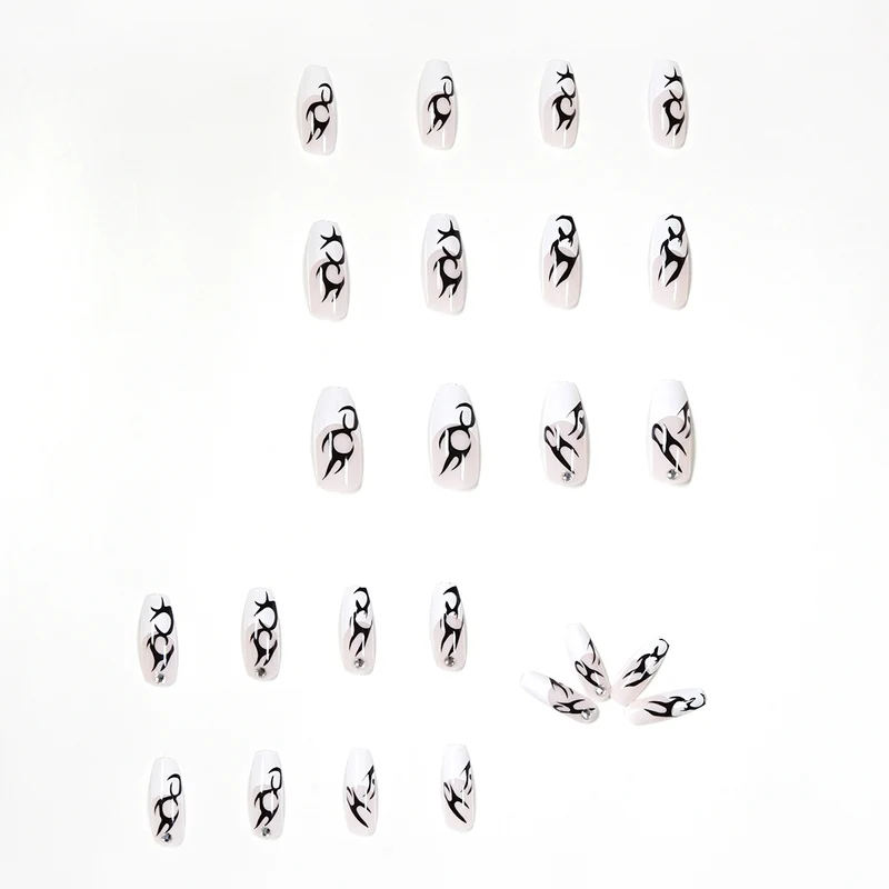 Elegant Artificial Nails with Decorative Black and Glitter Accents Stornfield