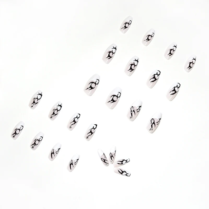 Elegant Artificial Nails with Decorative Black and Glitter Accents Stornfield