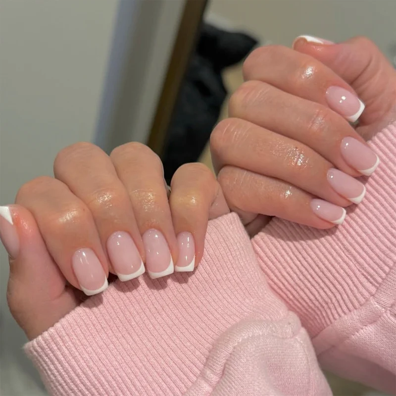 Elegant high-gloss nail art with French design Stornfield