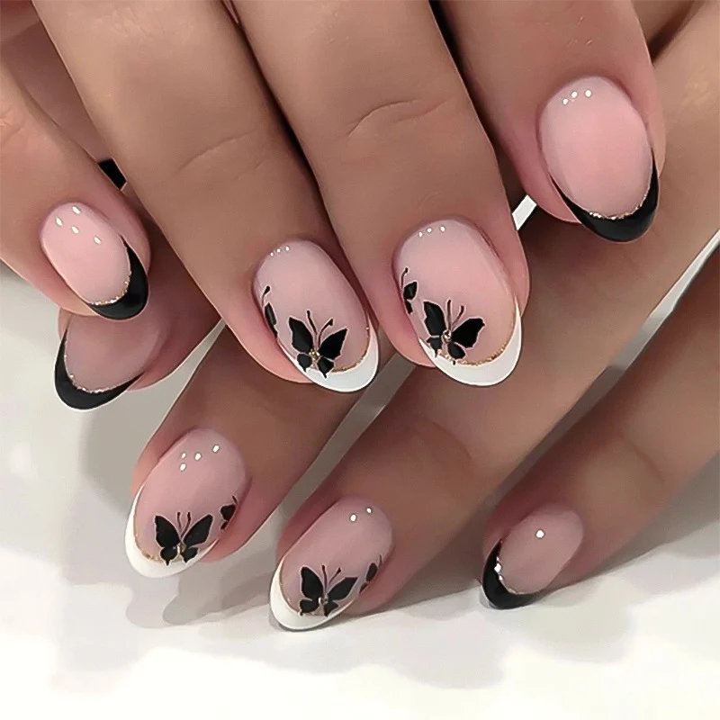 Elegantly designed nail art with butterfly motif Stornfield