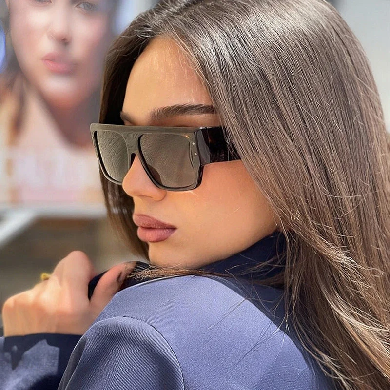 Dame moteriktig solbrille med rektangulært ramme og polarisert glass Luvikno