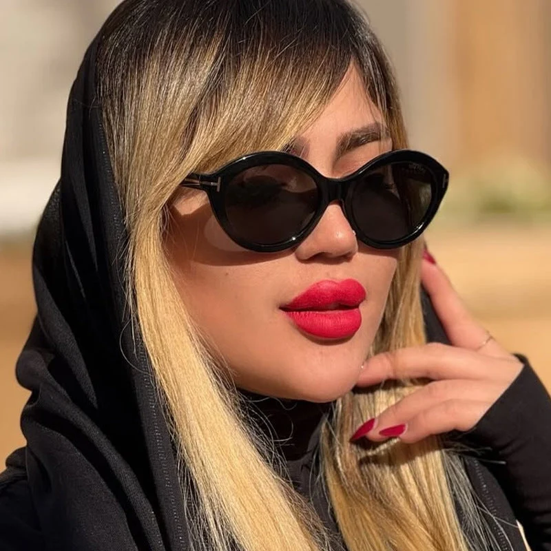 Dame moteriktig solbrille med innovativ oval ramme og UV-beskyttelse Luvikno