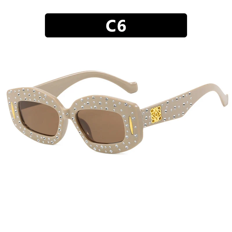 Dame moteriktig solbrille med glamorøs strass-dekor Luvikno