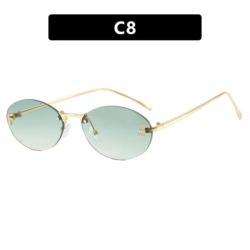 Dame moteriktig solbrille med elegant, speilreflekterende glassfront og filigran metallramme Luvikno