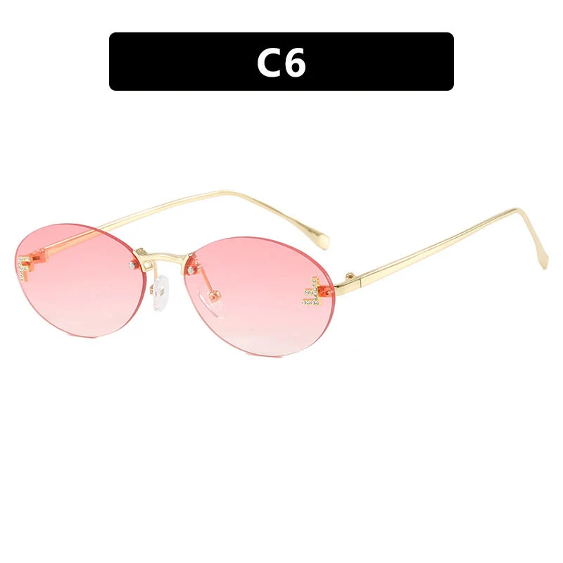 Dame moteriktig solbrille med elegant, speilreflekterende glassfront og filigran metallramme Luvikno