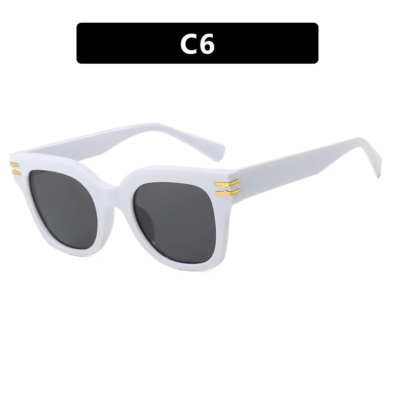 Dame moteriktig solbrille med elegante aksenter Luvikno