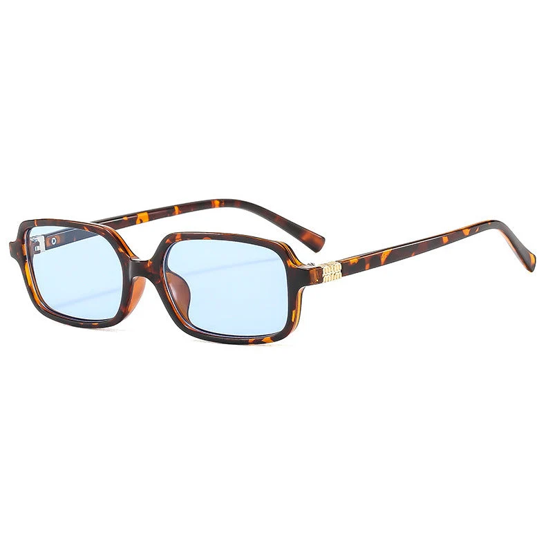 Dame moteriktig solbrille med elegant plastramme og originalt design Luvikno