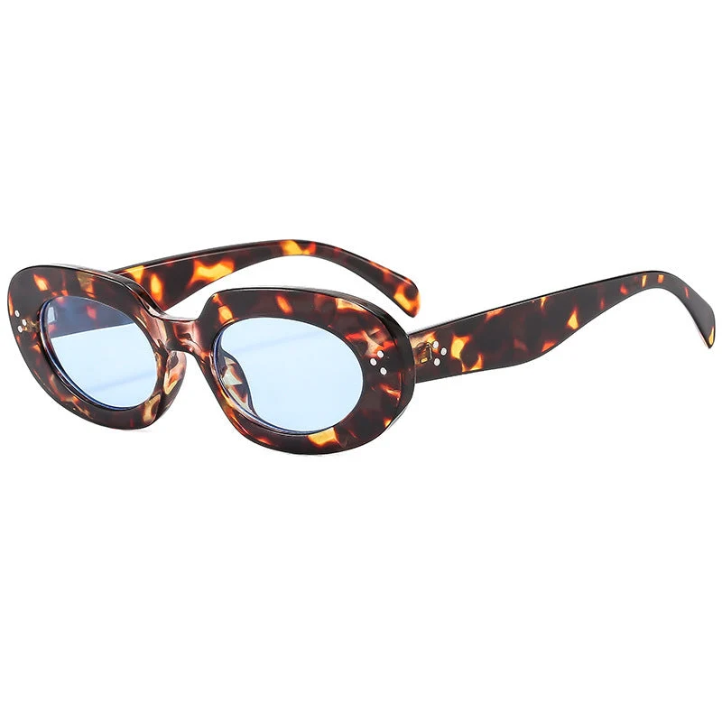Dame moteriktig solbrille med unikt ovalt ramme og beskyttende glass Luvikno