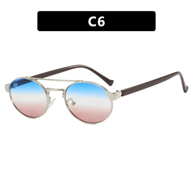 Dame moteriktig solbrille i stilfullt rundt design med gull aksenter Luvikno