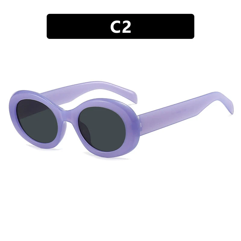 Dame moteriktig solbrille i original oval design med transparent ramme og UV-beskyttelse Luvikno
