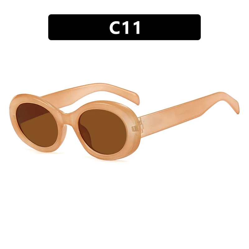 Dame moteriktig solbrille i original oval design med transparent ramme og UV-beskyttelse Luvikno