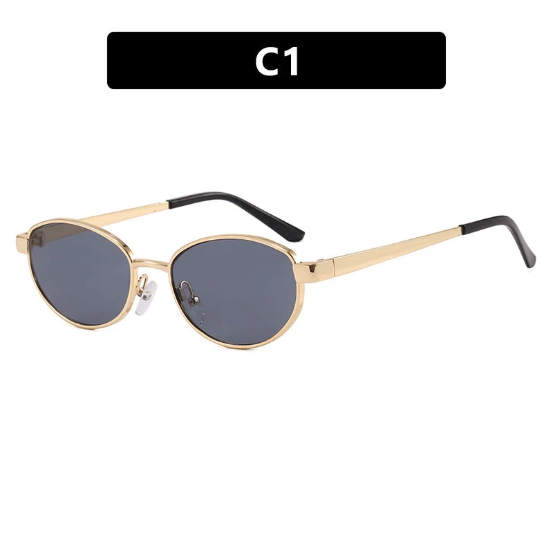 Dame moteriktig solbrille i elegant oval design med ramme i høykvalitets metall Luvikno