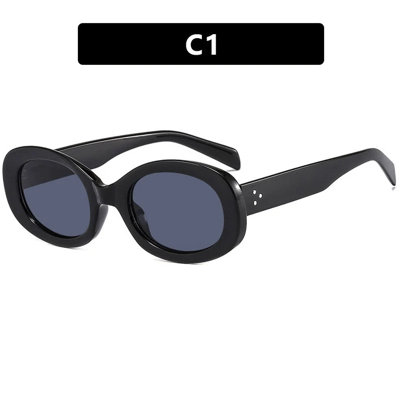 Dame moteriktig solbrille i elegant ovalt design med robust ramme Luvikno