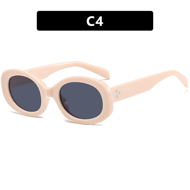 Dame moteriktig solbrille i elegant ovalt design med robust ramme Luvikno