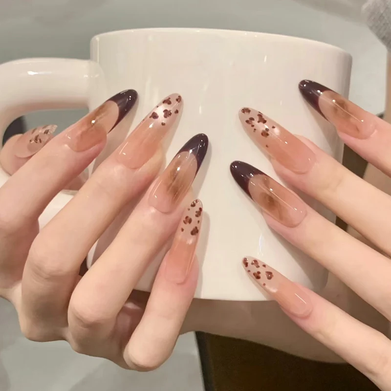 Artistic Stiletto Press-On Nails with Unique Animal Print Accents Stornfield
