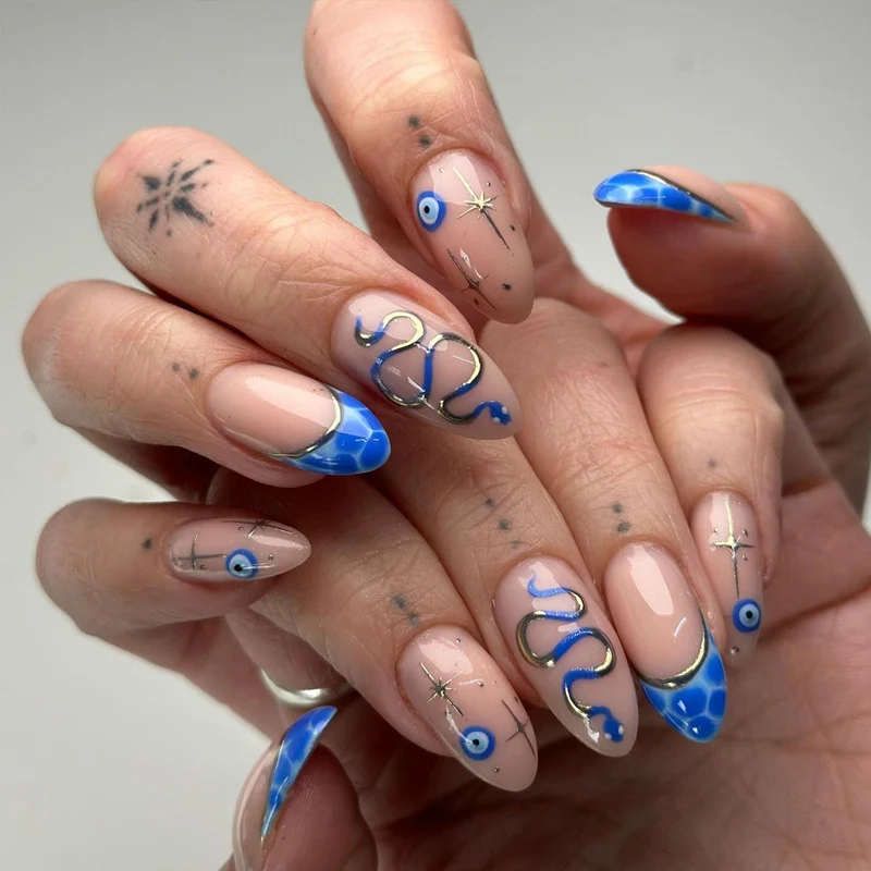 Artistic Stiletto Press-On Nails with Decorative Blue Elements Stornfield
