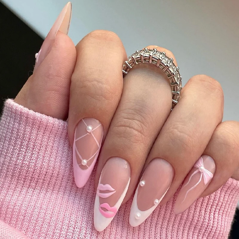 Artistic Stiletto Press-On Nail Set with Unique Kiss and Pearl Designs Stornfield