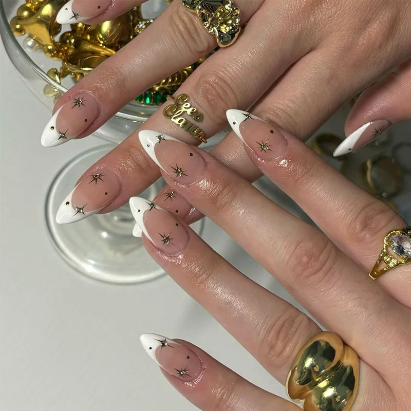 Artistic Stiletto Press-On Nail Art with Star and Ombre Design Stornfield