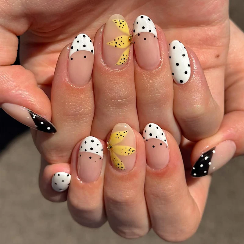 Artistic Press-On Nails with Floral and Polka Dot Designs Stornfield