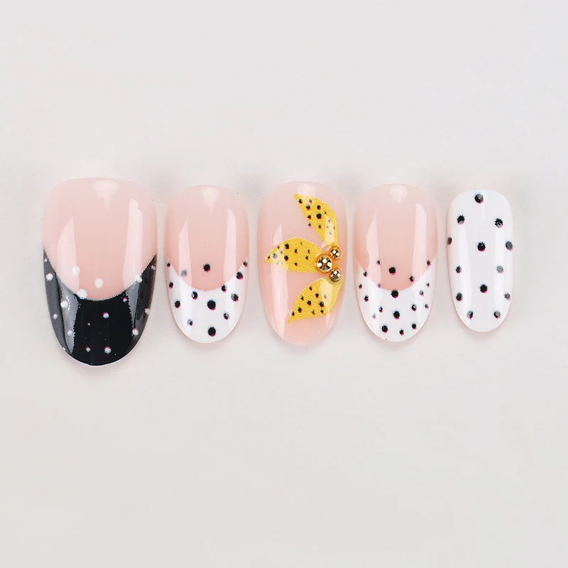 Artistic Press-On Nails with Floral and Polka Dot Designs Stornfield
