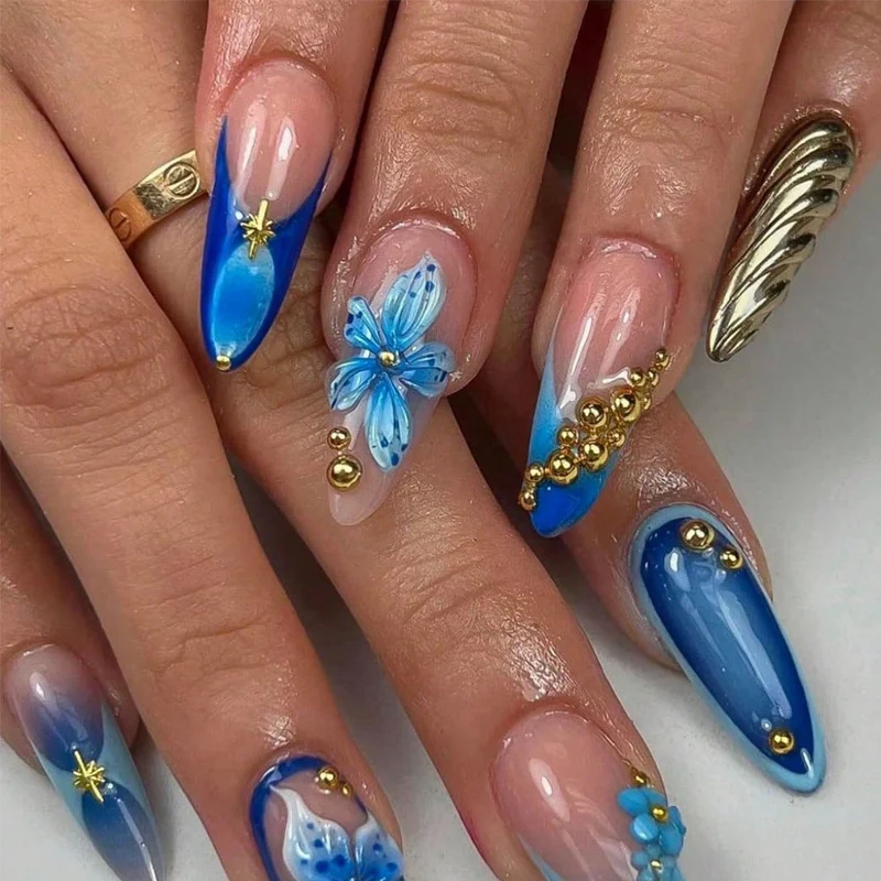 Artistic Press-On Nails with Floral and Metallic Accents Stornfield