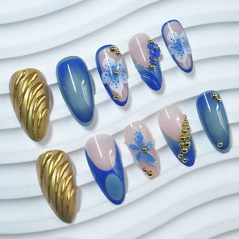 Artistic Press-On Nails with Floral and Metallic Accents Stornfield