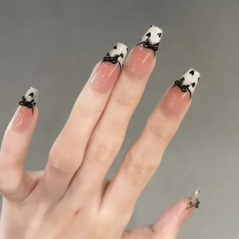 Artistic Press-On Nail Tips with Heart Accents Stornfield