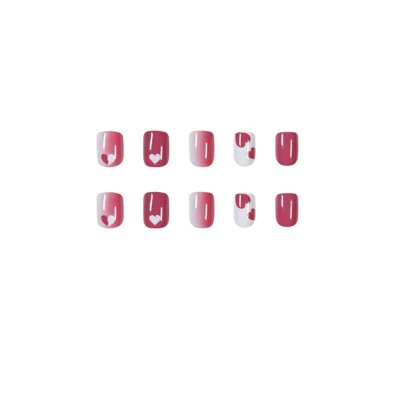 Creative nail art with heart motif and high-gloss finish Stornfield