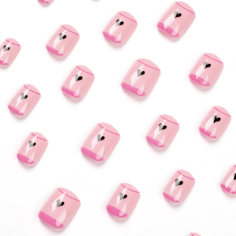 Creative Nail Art with Heart Design and Glitter Accents Stornfield