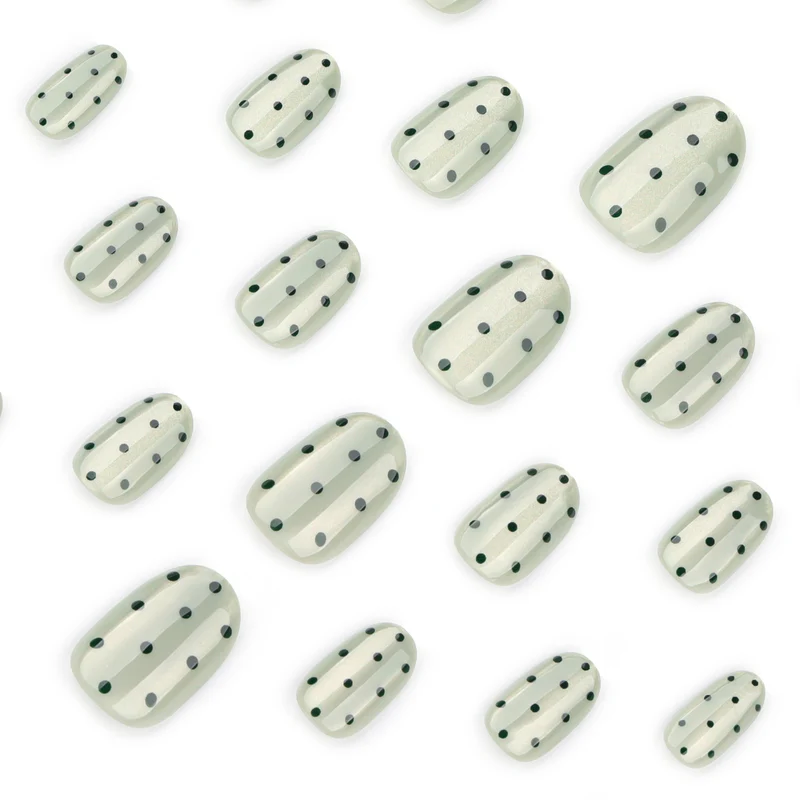 Creative Nail Art with Polka Dot Pattern Stornfield