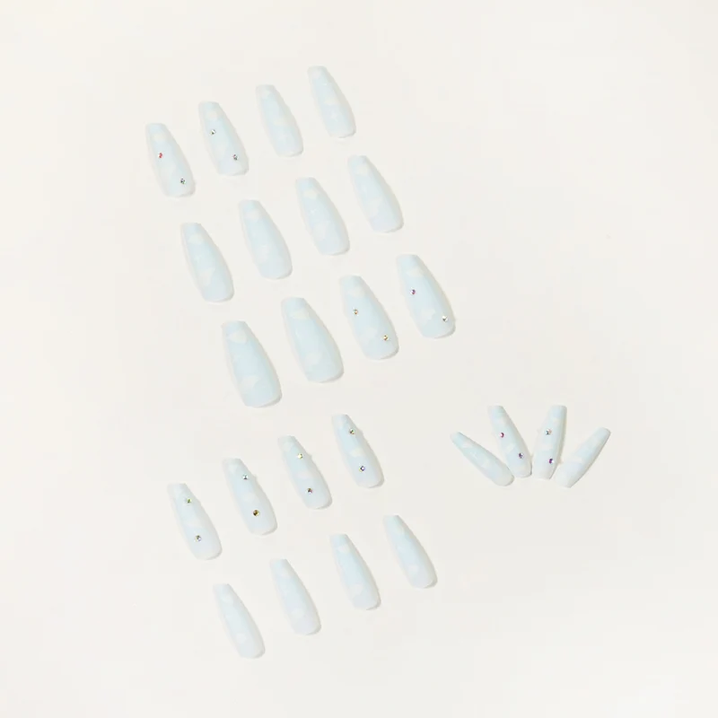 Creative nail art in cloud design with glitter accents Stornfield