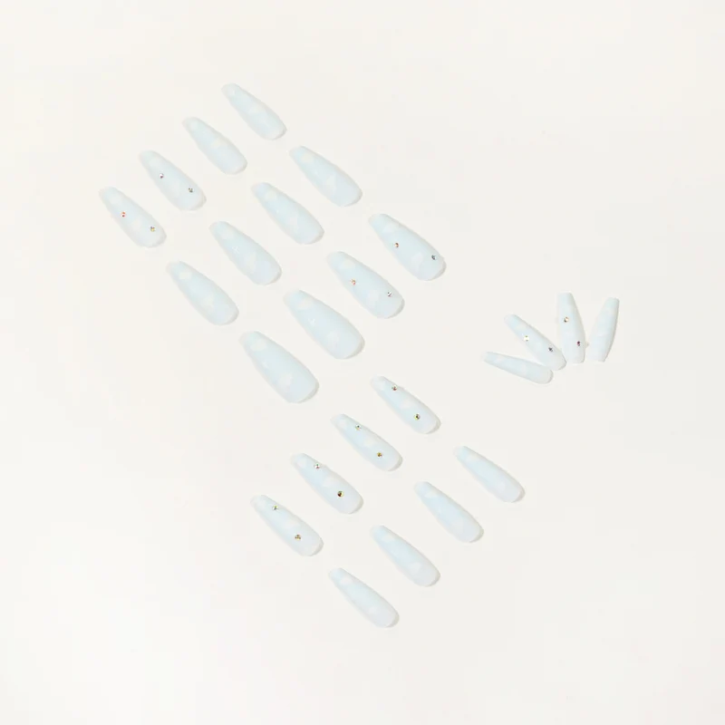 Creative nail art in cloud design with glitter accents Stornfield