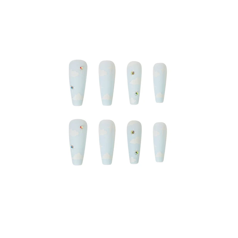 Creative nail art in cloud design with glitter accents Stornfield