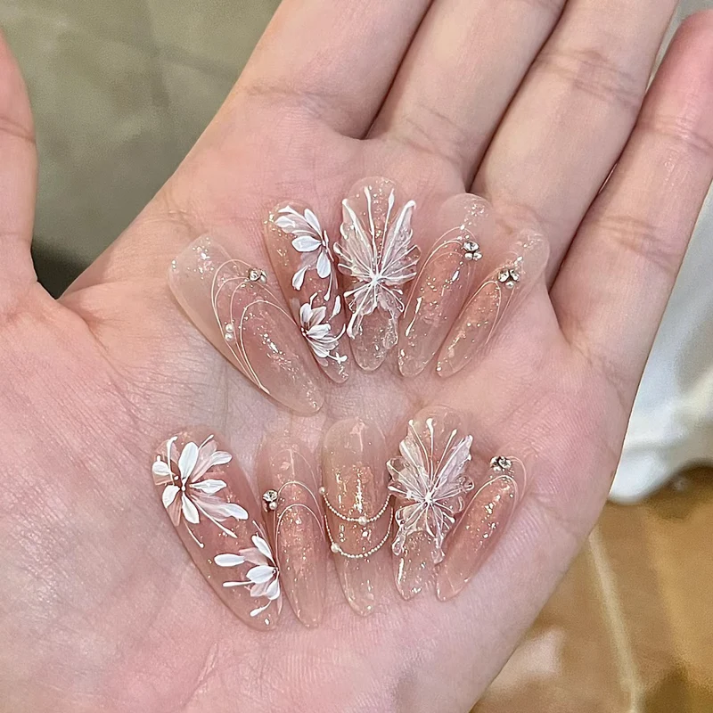 Elegante Lange Press-On Nägel Set mit Künstlerischen Spitzen Karnz